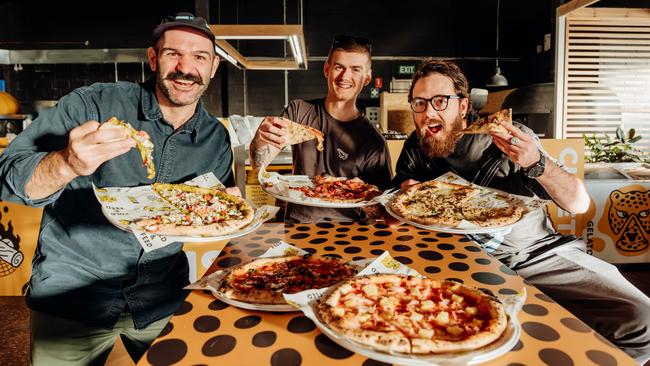 One Sneaky Cheetah’s Anthony Mitolo, Nicholas Genovese and Mark McInerney dig in. Picture: George Sotiropoulos