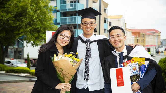 Chia-Chi Lin, Chun-Yi Wu and Kuo-Ming Tsai. University of Tasmania Graduations. Federation Concert Hall, Hobart. Picture: RICHARD JUPE