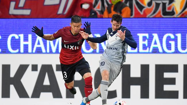 Robbie Kruse (right) will miss the rest of the A-League season. Picture: Atsushi Tomura/Getty Images