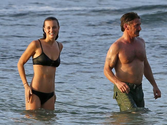 Sean Penn and Leila George. Penn's son Hopper was also spotted on the beach with a friend.  Picture: Splash News