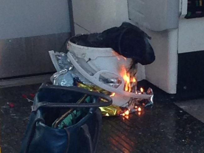 The bucket in a plastic bag believed to have caused the explosion, with protruding wires visible. Picture: Twitter