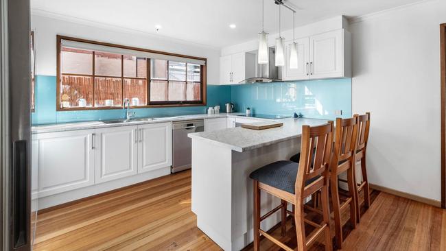 The open-plan kitchen and meals area.