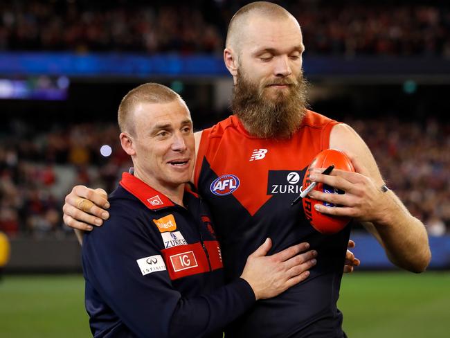 Max Gawn of the Demons celebrates with Simon Goodwin