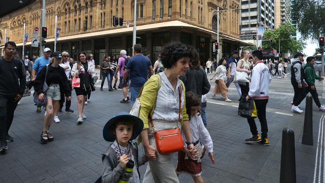 Pedestrians move along George Street in Sydney, Australia. Treasurer Jim Chalmers will deliver his third federal budget on Tuesday. (Photo by Lisa Maree Williams/Getty Images) (Photo by Lisa Maree Williams/Getty Images)