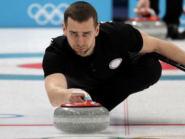 FILE - In this Feb. 7, 2018, file photo, Russian curler Alexander Krushelnitsky practices ahead of the 2018 Winter Olympics in Gangneung, South Korea. Krushelnitsky was stripped of his Olympic bronze medal after admitting to a doping violation at the Pyeongchang Games. Krushelnitsky tested positive for meldonium, which is believed to help blood circulation, after winning bronze in mixed doubles with his wife, Anastasia Bryzgalova. (AP Photo/Aaron Favila, File)