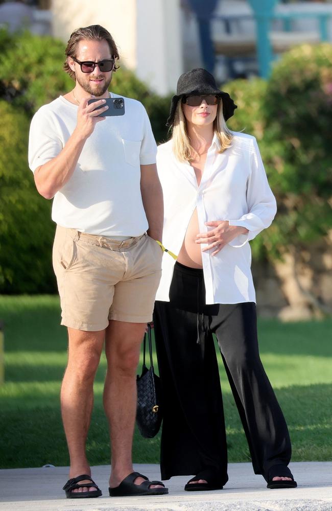 Margot Robbie displays her baby bump in Sardinia with husband Tom Ackerley. Picture: CIAOPIX / COBRA TEAM / BACKGRID