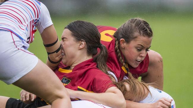 Central Coast player (l) Danielle Theron cops an elbow to the face during their NSW Country Women's Rugby 7s round-robin game v Newcastle Hunter at Woy Woy Oval on Saturday, 14 March, 2020. Picture: Troy Snook