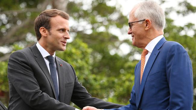 French president Emmanuel Macron with Australian Prime Minister Malcolm Turnbull  in Sydney earlier this month. France was awarded a $50b contract to provide the Australian navy with the world’s most advanced submarines. Photo Jason McCawley/Getty Images.