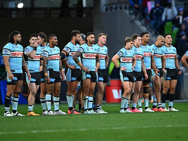 Sharks players look on after another Storm try. Picture: Quinn Rooney/Getty Images