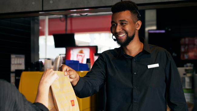 McDonald’s is teaming up with universities to offer micro-credentials that can be stacked to earn credit towards a degree. Tom Habtewold, restaurant manager at McDonald’s Kellyville in Sydney, is one of the first students. Picture: Henrique Fanti.