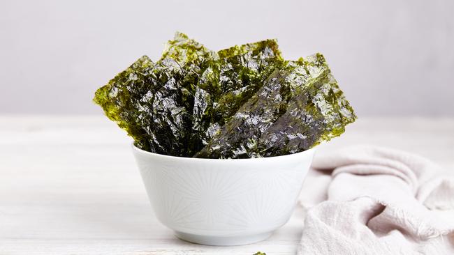 Snack on roasted seaweed or sprinkle it into salads. Picture: Getty Images