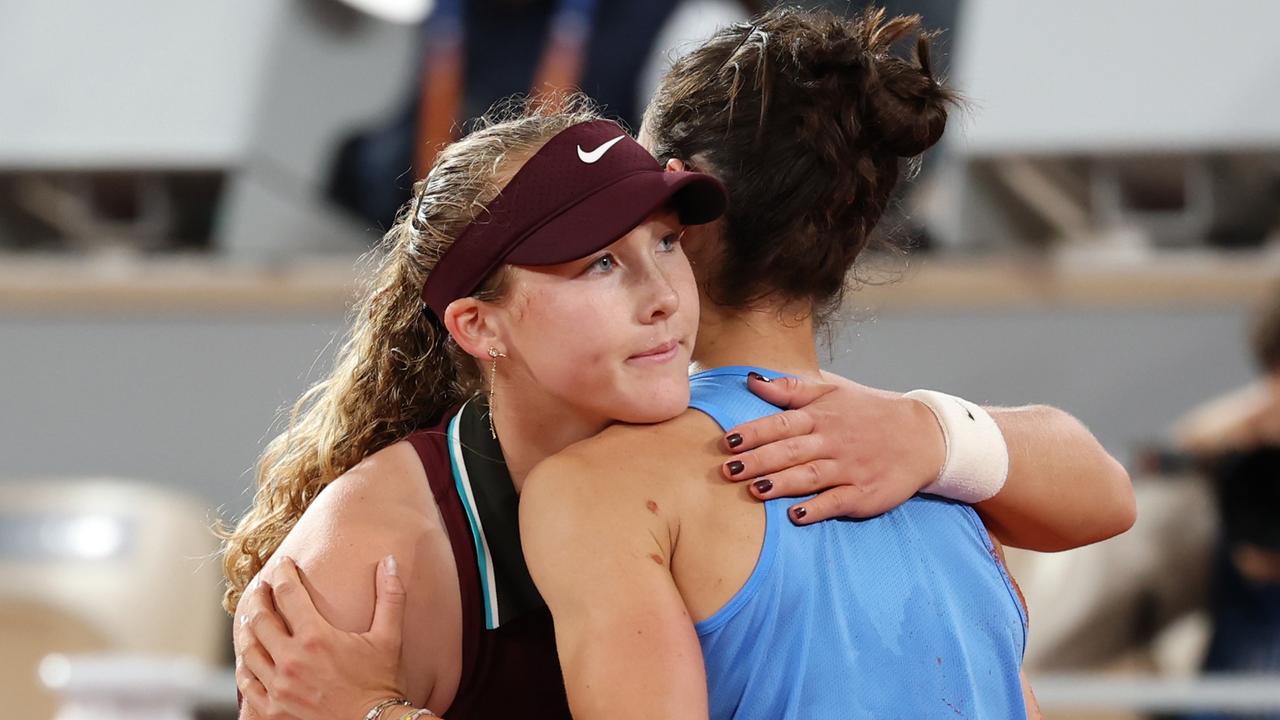 Mirra Andreeva hugs Lois Boisson of France after her defeat in the French Open women's Singles Quarter Final. (Photo by Julian Finney/Getty Images) *** BESTPIX ***