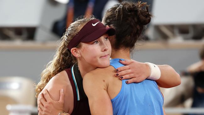 Mirra Andreeva hugs Lois Boisson of France after her defeat in the French Open women's Singles Quarter Final. (Photo by Julian Finney/Getty Images) *** BESTPIX ***