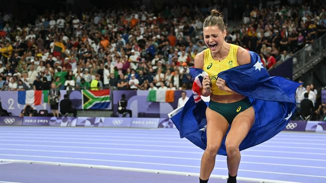 Australia's Nina Kennedy celebrates after winning the women's pole vault final. (Photo by Andrej ISAKOVIC / AFP)