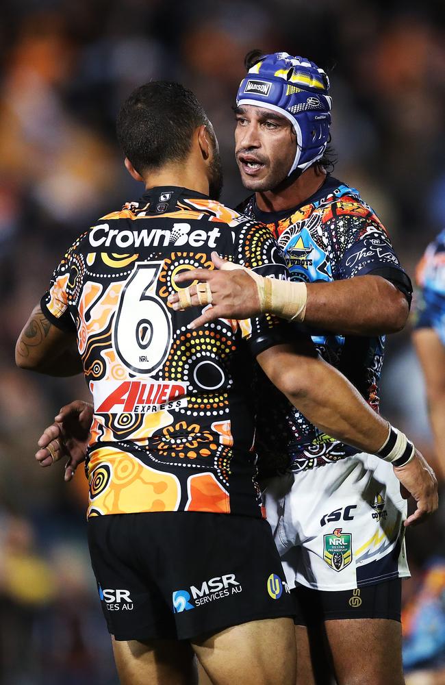 Benji Marshall and Johnathan Thurston embrace at full-time. Picture. Phil Hillyard