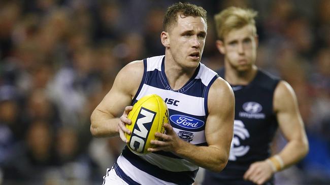 AFL Round 21 Carlton v Geelong AT Etihad Stadium. Joel Selwood runs the ball out of defence . Pic: Michael Klein. Friday August 15, 2014.