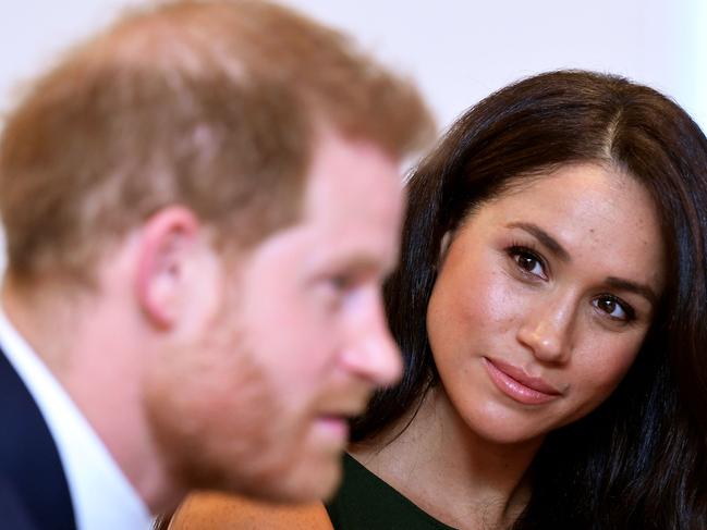 (FILES) In this file photo taken on October 15, 2019 Britain's Prince Harry, Duke of Sussex, and Britain's Meghan, Duchess of Sussex attend the annual WellChild Awards in London on October 15, 2019. - Meghan Markle has revealed she suffered a miscarriage in July this year, writing in the New York Times on November 25, 2020 of the deep grief and loss she endured with her husband Prince Harry. (Photo by TOBY MELVILLE / POOL / AFP)