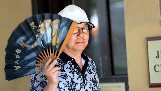 Jian Lu Li, father of Wei Li, outside court.