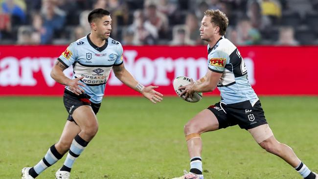 Matt Moylan of the Sharks in possession with Shaun Johnson in support during the Round 6 NRL match between the Cronulla-Sutherland Sharks and the Canterbury-Bankstown Bulldogs at Bankwest Stadium in Sydney, Sunday, June 21, 2020. (AAP Image/David Neilson) NO ARCHIVING, EDITORIAL USE ONLY