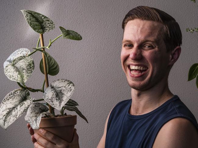 QBM - Dylan Blonde with his indoor plants. Photo Mark Cranitch.