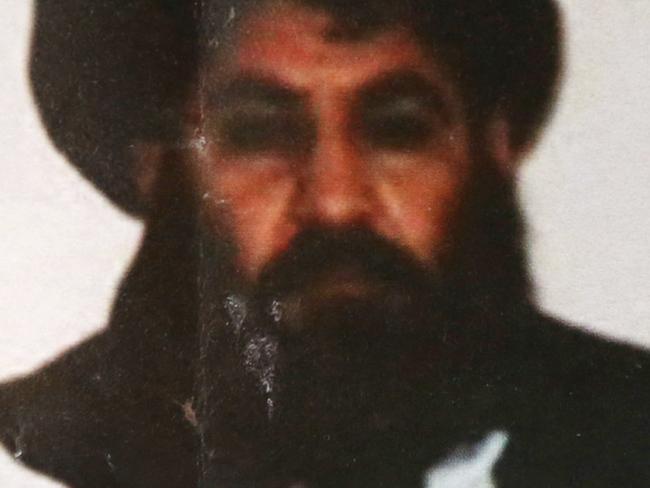 FILE - In this Saturday, Aug. 1, 2015 file photo, shows Taliban leader Mullah Mansour. The U.S. conducted an airstrike Saturday, May 21, 2016, against the Taliban leader the Pentagon said, and a U.S. official said Mansour was believed to have been killed. Pentagon press secretary Peter Cook said the attack occurred in a remote region along the Afghanistan-Pakistan border. He said the U.S. was studying the results of the attack. (AP Photo/Rahmat Gul, File)