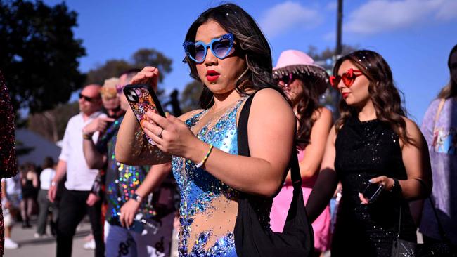 Swifties turned to glitter and gems for their costumes. Picture: William West / AFP