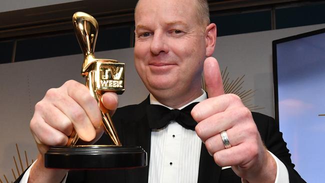 Tom Gleeson poses for a photograph after winning the Gold Logie for most popular personality on Australian TV during the 2019 Logie Awards at The Star Casino on the Gold Coast, Sunday, June 30, 2019. (AAP Image/Darren England) NO ARCHIVING, EDITORIAL USE ONLY