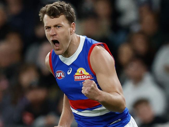 MELBOURNE, AUSTRALIA - MAY 31: Jack Macrae of the Bulldogs celebrates a goal during the 2024 AFL Round 12 match between the Collingwood Magpies and the Adelaide Crows at The Melbourne Cricket Ground on May 31, 2024 in Melbourne, Australia. (Photo by Michael Willson/AFL Photos via Getty Images)