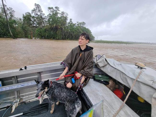 A woman and her dog take to a boat in the Daintree region. Picture: Supplied