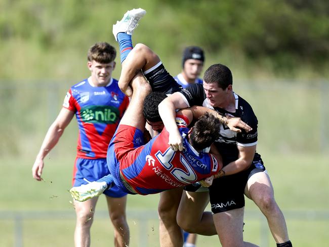 Will Cannavo is hit hard. Picture: Michael Gorton