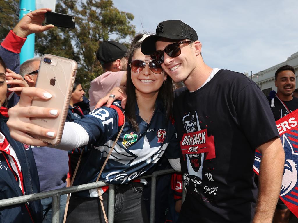 Rebecca Warian and Sam Verrills pictured at the Sydney Roosters fan morning at Moore Park after the Roosters win in the 2019 NRL Grand Final. Picture: Richard Dobson