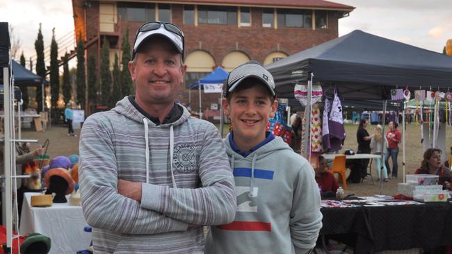 Brendan and Seamus Ryan enjoy the Warwick Christian College Bargains and Buskings Fair. Photo Michael Cormack / Warwick Daily News