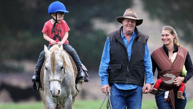 The Becker family who operate Cradle Country Adventures — Liam, 4, on Stingo, with Ray, Laura and baby Ned pictured at Kimberley. Picture: CHRIS KIDD