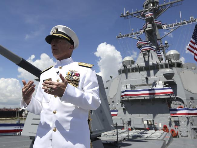 Admiral Craig Faller, commander of U.S. Southern Command, speaks with the news media following a commissioning ceremony for the U.S. Navy's guided missile destroyer, the USS Paul Ignatius, Saturday, July 27, 2019, at Port Everglades in Fort Lauderdale, Fla. (AP Photo/Lynne Sladky)