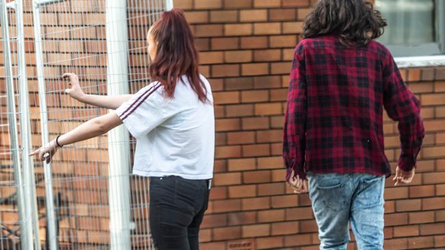 A woman who is believed to be the daughter of the deceased at 41 Leonard Street, Bomaderry, North of Nowra. Picture: Monique Harmer