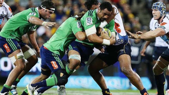 Nasi Manu of the Highlanders is tackled.