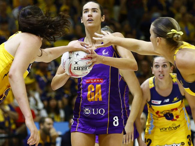 Firebirds GA Emily Moore under pressure from Lighning defenders. Picture: Getty Images