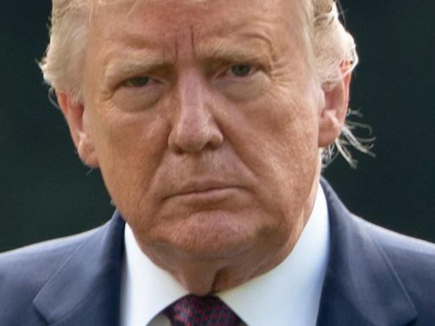 US President Donald Trump and First Lady Melania Trump return to the White House in Washington, DC, on September 11, 2020. - President Trump and the First Lady traveled to  Shanksville, Pennsylvania, to attend the 19th anniversary commemoration for the 9/11 attacks. (Photo by ANDREW CABALLERO-REYNOLDS / AFP)