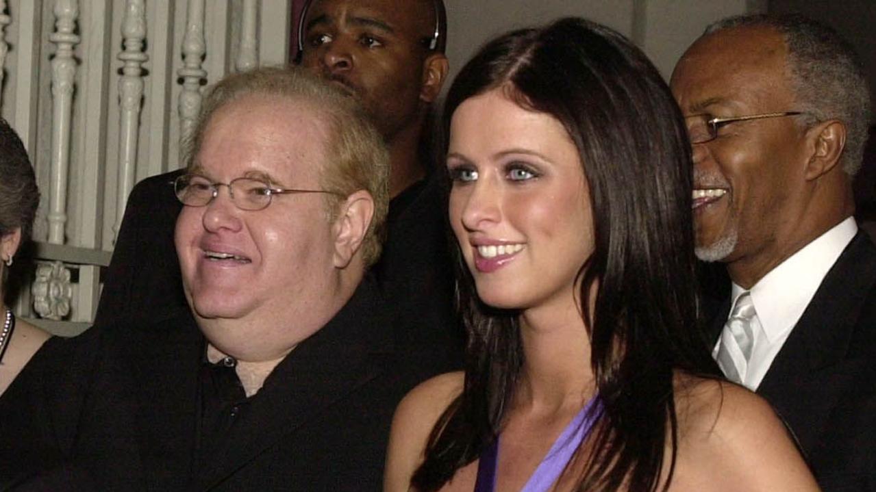 Nicky Hilton stands next to Pearlman at an opening for her sister Paris’ nightclub in 2004. Picture: Peter Cosgrove