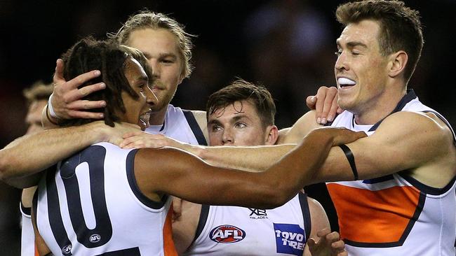 Fighting chance? Giants players celebrate another goal against Carlton in Round 20.