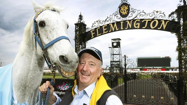 Melbourne Cup winner Subzero at Flemington to promote 150 year anniversary in 2014. Owner Graham Salisbury with form Melbourne Cup winner Subzero raising a smile for the camera in the mounting enclosure at Flemington. Photo David Caird