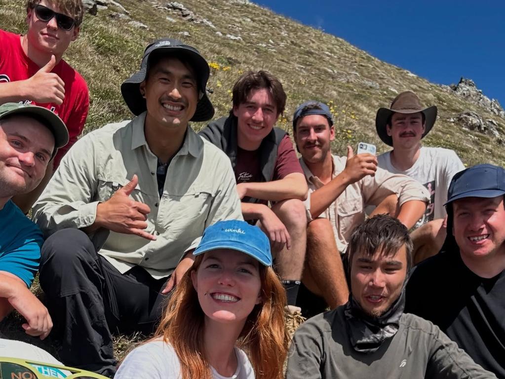 Hadi Nazari with Jessica and the hiking group who found him.