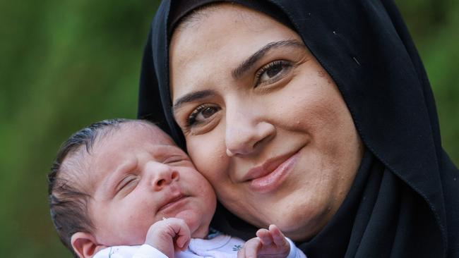 Saada Houli will allow her daughter, Mya, to take part in the Victorian government’s Gen V study. Picture: David Geraghty