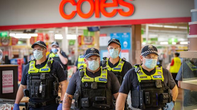 Members of Victoria Police patrol through Chadstone shopping centre in Melbourne during the week. Picture: Getty Images