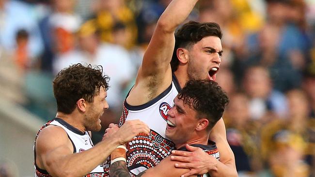 Tim Taranto celebrates a goal against the Eagles. Picture: Getty Images