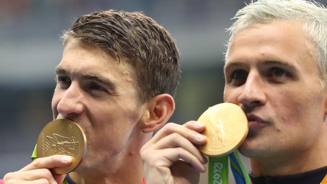 Michael Phelps and ‘The Other Guy’. Picture: AP Photo/Lee Jin-man