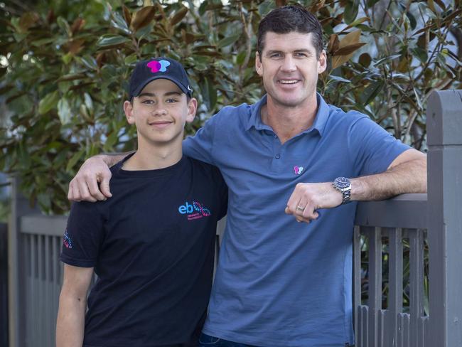 Jonathon Brown,commentator, ex-footy player, and Nina Azzopardi and her son Otto.Browny and Otto are good mates and the families are close. Otto suffers from a very rare skin condition called EB and Browny is his mentor.Picture by Wayne Taylor 17th July 2023