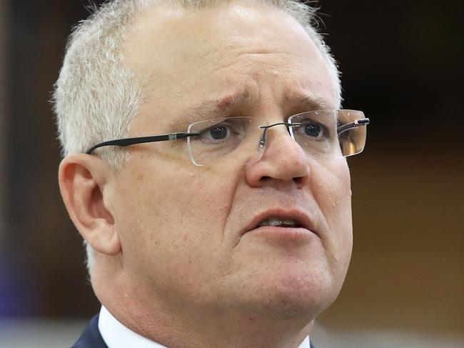 SYDNEY, AUSTRALIA - JULY 20: Prime Minister Scott Morrison speaks to the media during a visit to the DisplayWise workshop in Miranda on July 20, 2020 in Sydney, Australia. The Federal Government is set to announce changes to the JobKeeper and JobSeeker programs this week when Treasurer Josh Frydenburg releases a budget update on Thursday 23 July. The wage subsidy and the boosted unemployment benefit programs introduced in response to the COVID-19 are set to end in September, however are expected to be revised and extended . (Photo by Mark Kolbe/Getty Images)