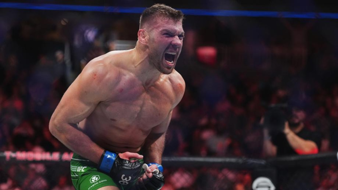 LAS VEGAS, NEVADA - JULY 08: Dricus Du Plessis of South Africa reacts after his knockout victory over Robert Whittaker of New Zealand in a middleweight fight during the UFC 290 event at T-Mobile Arena on July 08, 2023 in Las Vegas, Nevada. (Photo by Cooper Neill/Zuffa LLC via Getty Images)