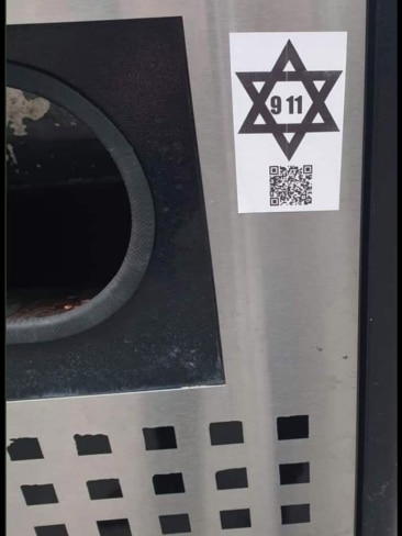 An anti-Semitic sticker in Melbourne's CBD with a QR coding linking to a video claiming the Jewish community were responsible for 9/11. Picture: Supplied